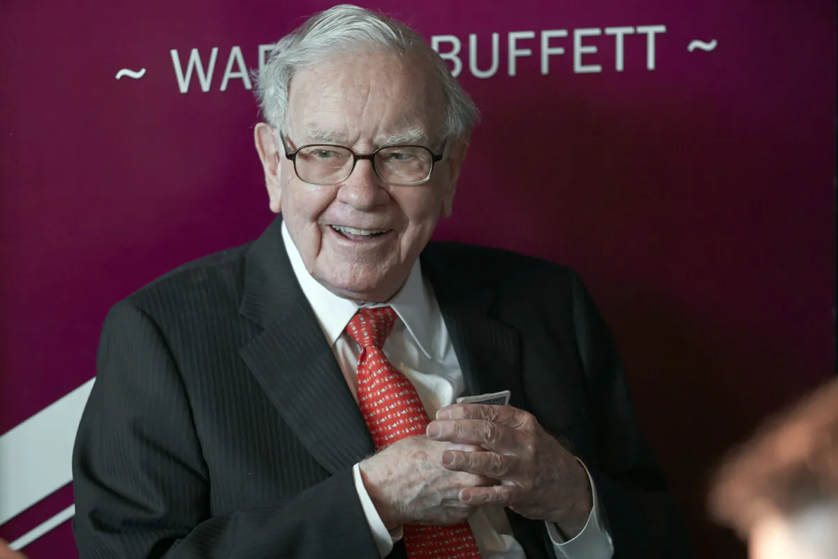 Warren Buffett, chairman and CEO of Berkshire Hathaway, smiles as he plays bridge following the annual Berkshire Hathaway shareholders meeting in Omaha, Neb., May 5, 2019. (Nati Harnik, File/AP Photo)