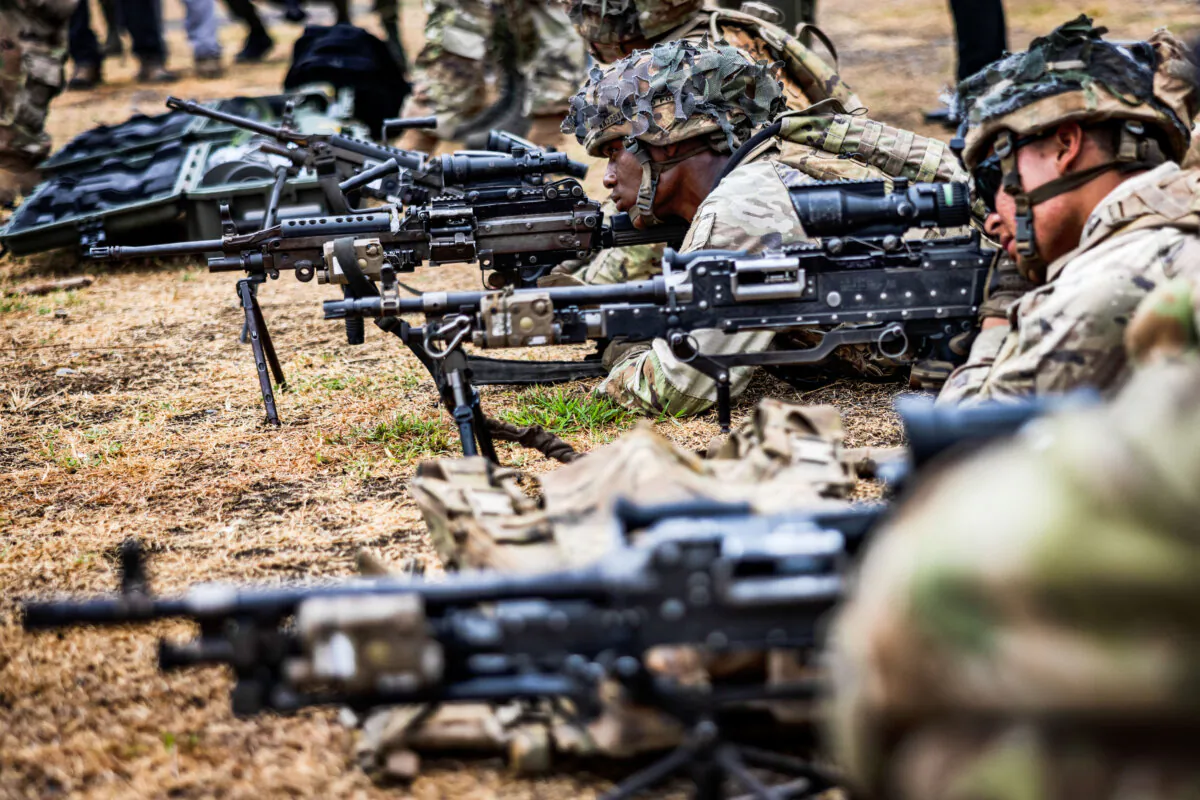 U.S. troops take part in weapons training during the "Balikatan" or "shoulder-to-shoulder" U.S.–Philippines joint military exercises in Fort Magsaysay in Nueva Ecija, Philippines, on April 13, 2023. (Ezra Acayan/Getty Images)