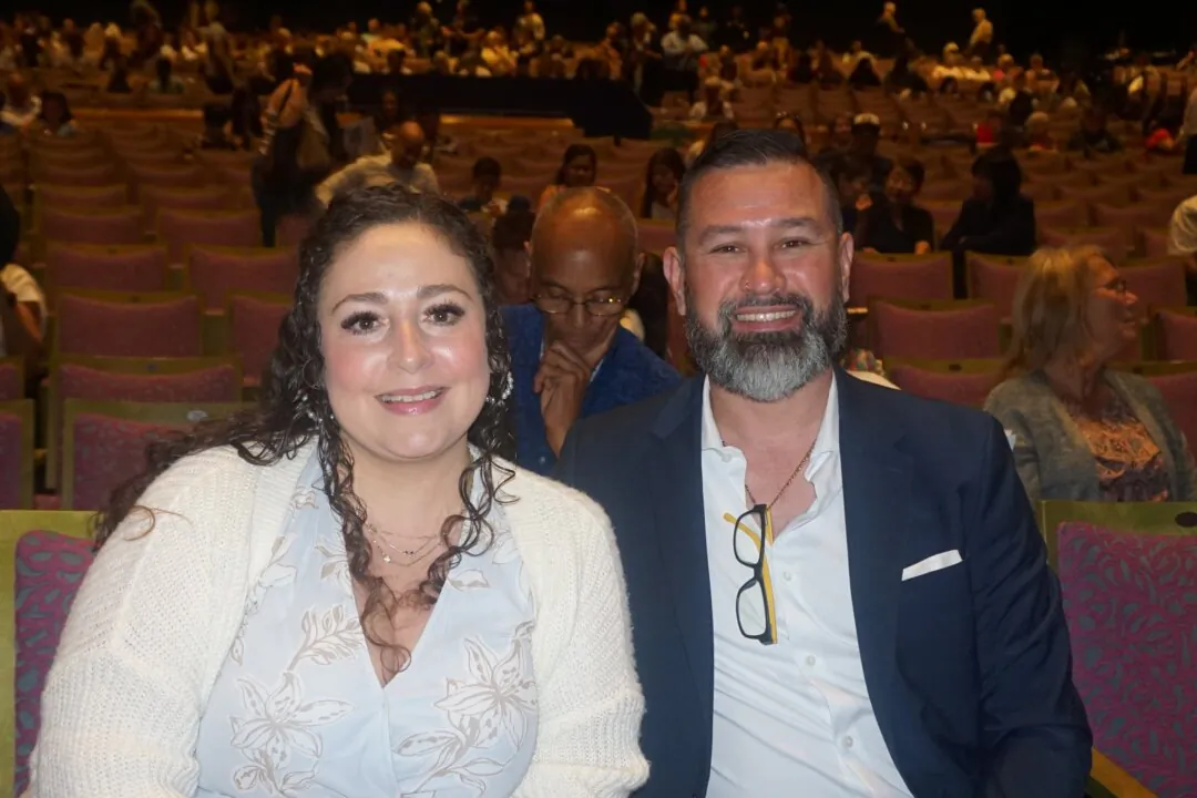 Mark and Leslie Ybarra attend Shen Yun Performing Arts at the McAllen Performing Arts Center in McAllen, Texas, on March 2, 2025. (Yeawen Hung/The Epoch Times)