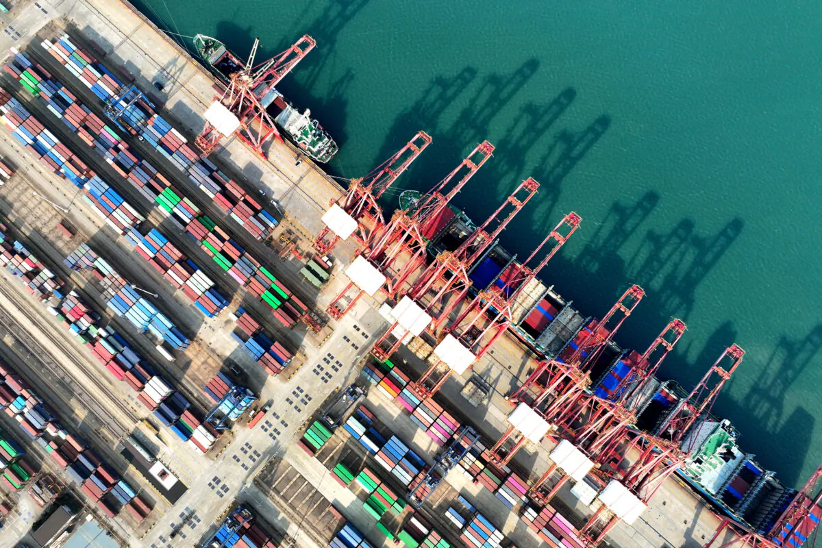 A container ship is loaded at the port in Lianyungang, in China's eastern Jiangsu Province, on Dec. 10, 2024. (STR/AFP via Getty Images)