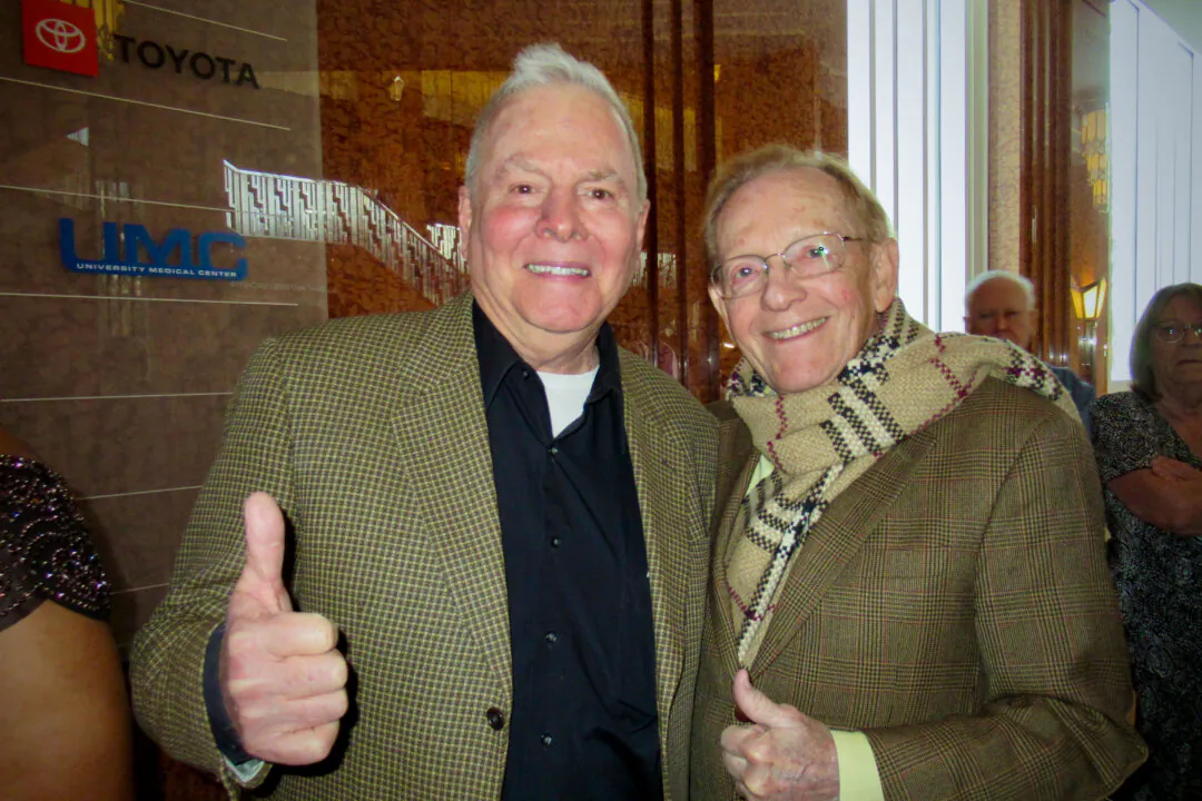 John Adair and John Forry (R) at the Shen Yun Performing Arts performance at The Smith Center for the Performing Arts on March 2, 2025. (Linda Jiang/The Epoch Times)