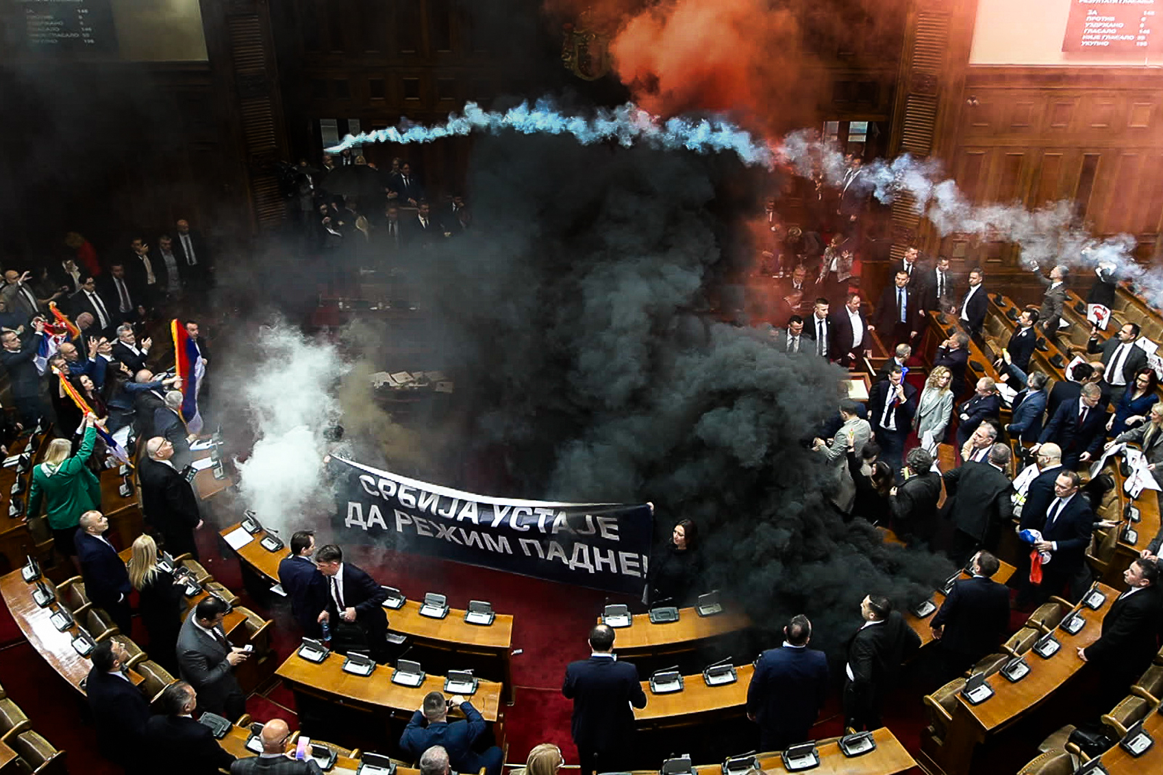 Day in Photos: Chaos in the Serbian Parliament, Trump’s Tariffs Take Effect, and Pancake Race in London