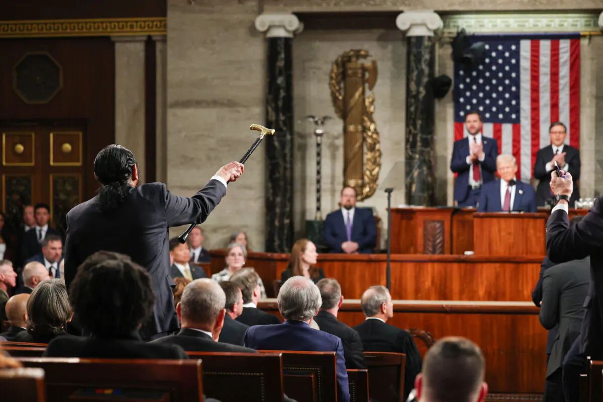 Rep. Al Green shouts as President Donald Trump addresses a joint session of Congress at the Capitol on March 4, 2025. (Win McNamee/AP)