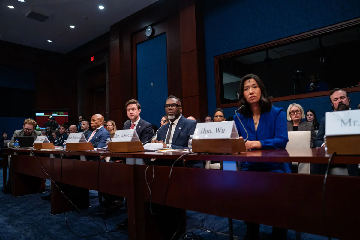 (L-R) New York City Mayor Eric Adams, Denver Mayor Mike Johnston, Chicago Mayor Brandon Johnson, and Boston Mayor Michelle Wu testify before the House Committee on Oversight and Government Reform on Capitol Hill in Washington on March 5, 2025. (Madalina Vasiliu/The Epoch Times)