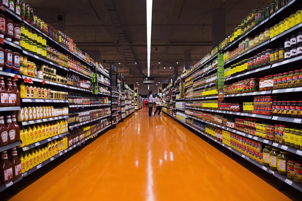 People shop at a Loblaws store in Toronto on May 3, 2018. (The Canadian Press/Nathan Denette) 