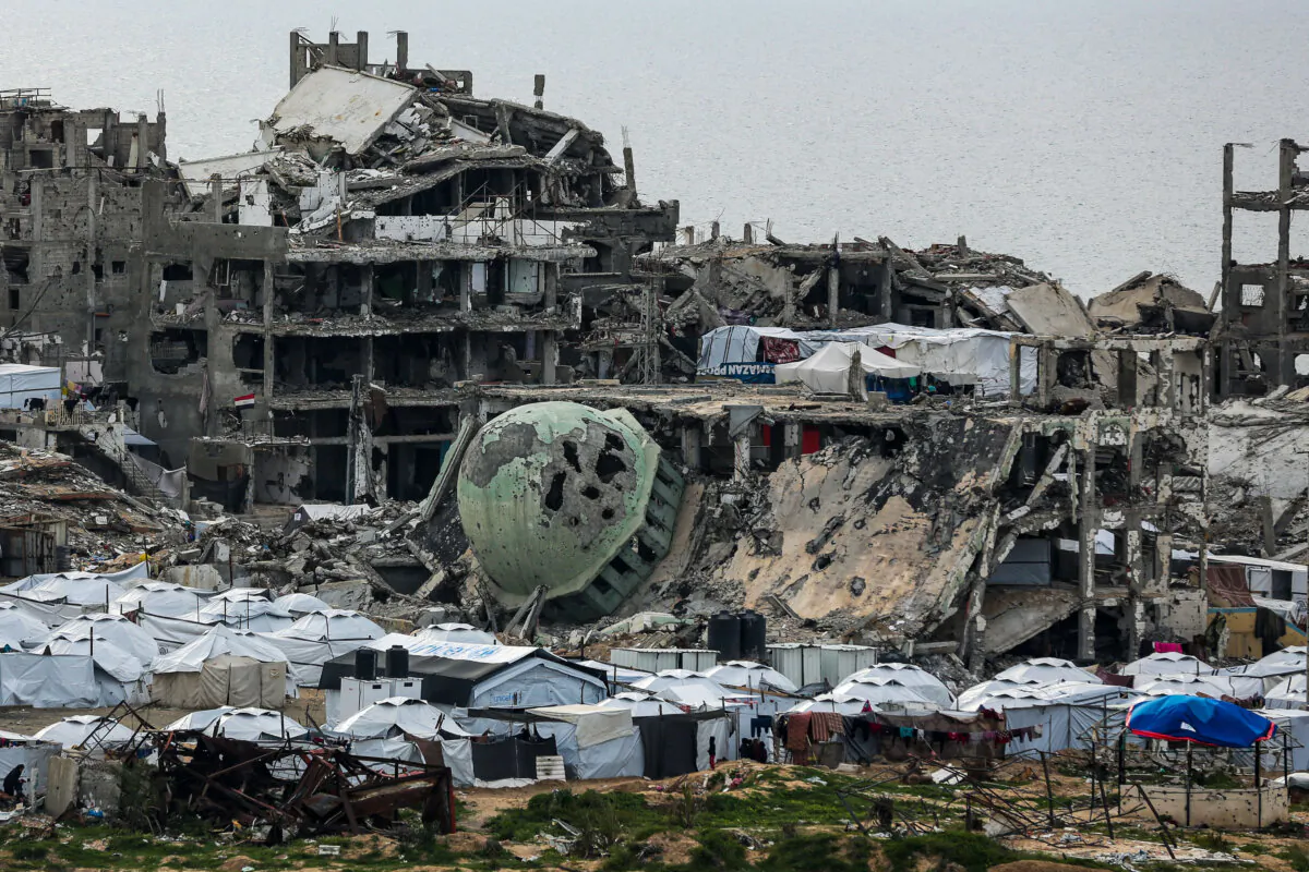 A tent camp for displaced Palestinians is set up amid destroyed buildings in the west of Al-Shati camp, west of Gaza City, on March 3, 2025. (Jehad Alshrafi/AP Photo)