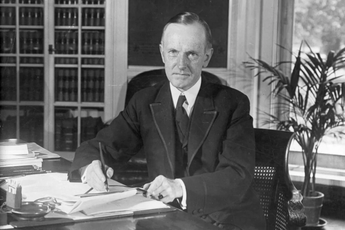 U.S. President Calvin Coolidge (1872–1933) at his desk, circa 1925. (Charles Phelps Cushing/FPG/Getty Images)