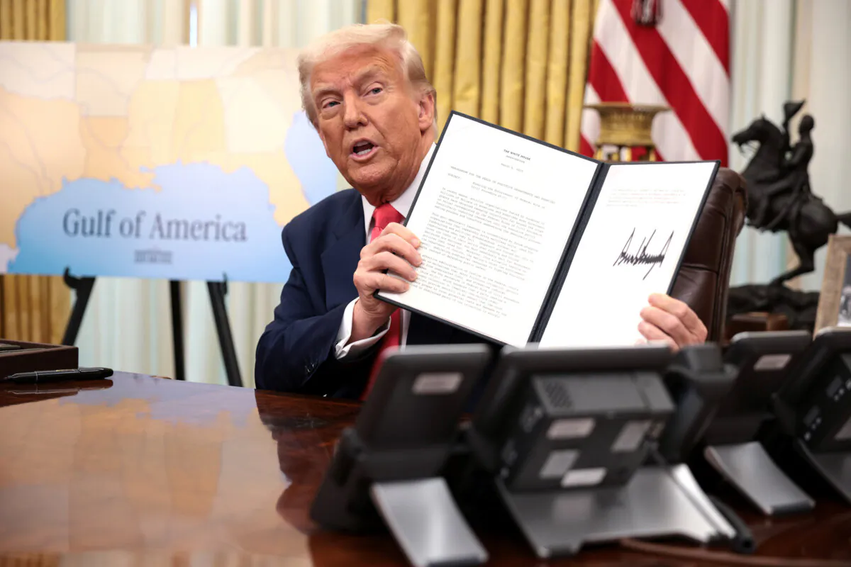 President Donald Trump signs executive orders in the Oval Office of the White House on March 6, 2025. (Alex Wong/Getty Images)