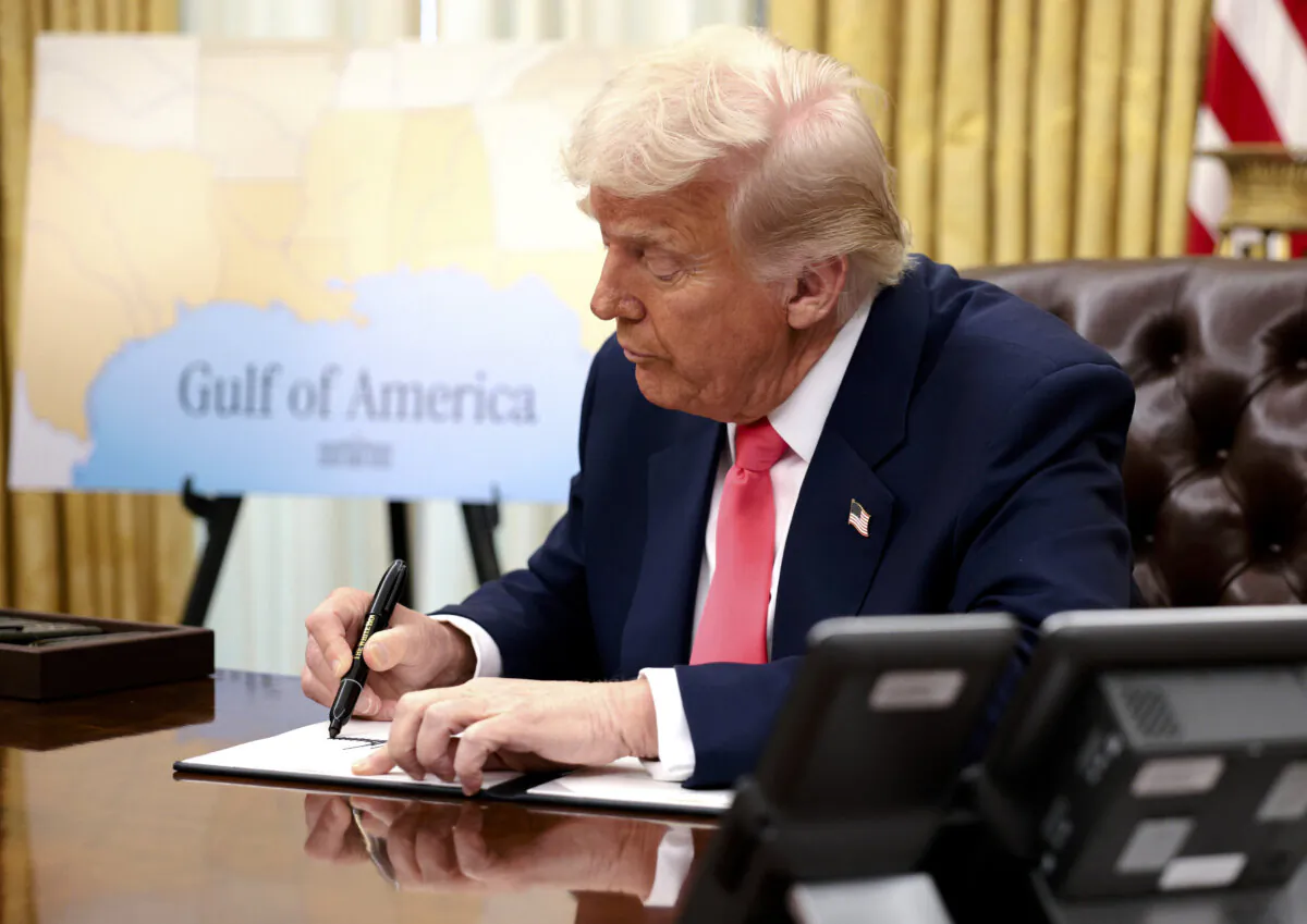 President Donald Trump signs executive orders in the Oval Office on March 6, 2025. (Alex Wong/Getty Images)