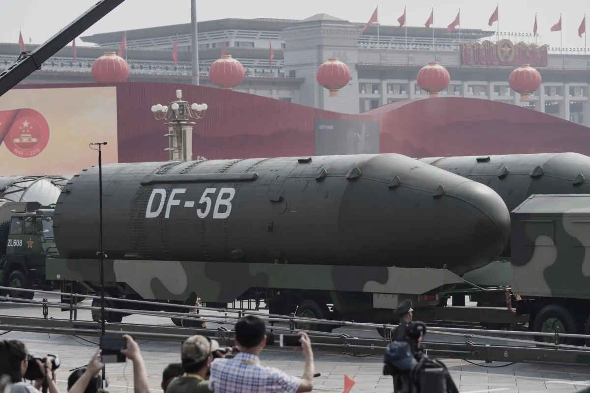 Military vehicles carrying DF-5B intercontinental ballistic missiles participate in a military parade at Tiananmen Square in Beijing on Oct. 1, 2019. (Greg Baker/AFP via Getty Images)