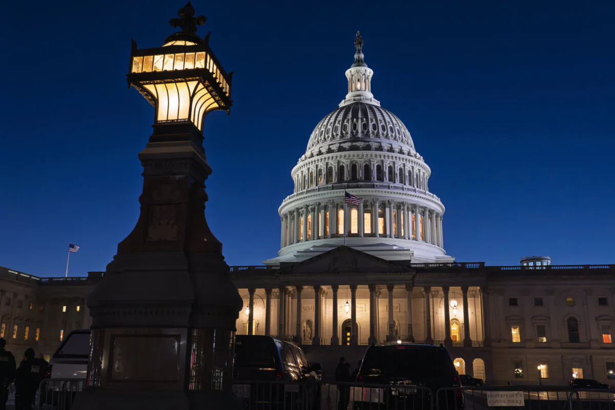 The U.S. Capitol is illuminated at dusk before President Donald Trump's address to a joint session of Congress, in Washington on March 4, 2025. (J. Scott Applewhite/AP Photo)