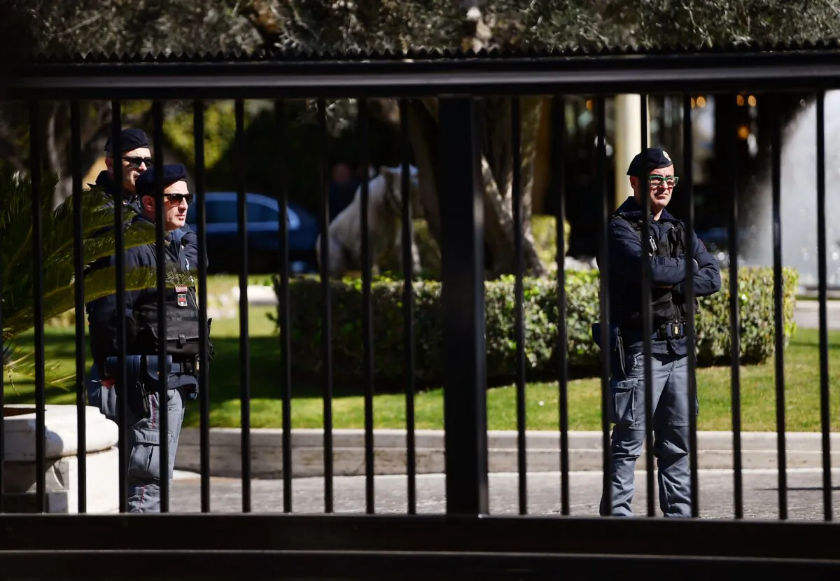 Police patrol at the main entrance of the Cavalieri Waldfor Astoria hotel in Rome on March 14, 2022, where U.S. national security adviser Jake Sullivan will meet wth senior Chinese Communist Party diplomat Yang Jiechi. (Filippo Monteforte/AFP via Getty Images)