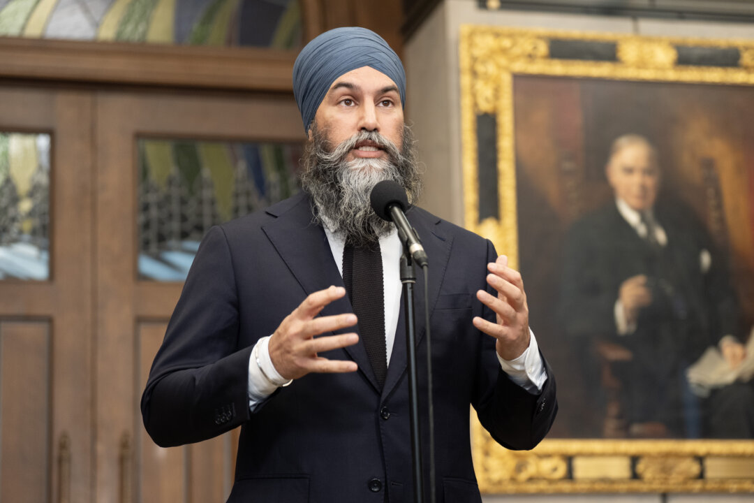 Singh Says Party Won’t Vote Non-Confidence Until Parliament Passes Tariff Aid Package