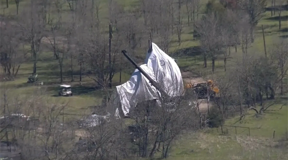 A large balloon used by U.S. Customs and Border Protection for surveillance along the Texas border that broke free on March 3, and traveled about 600 miles to the north as high winds swept through the state that crashed is shown in Quinlan, Texas, on March 5, 2025. (KDFW via AP)
