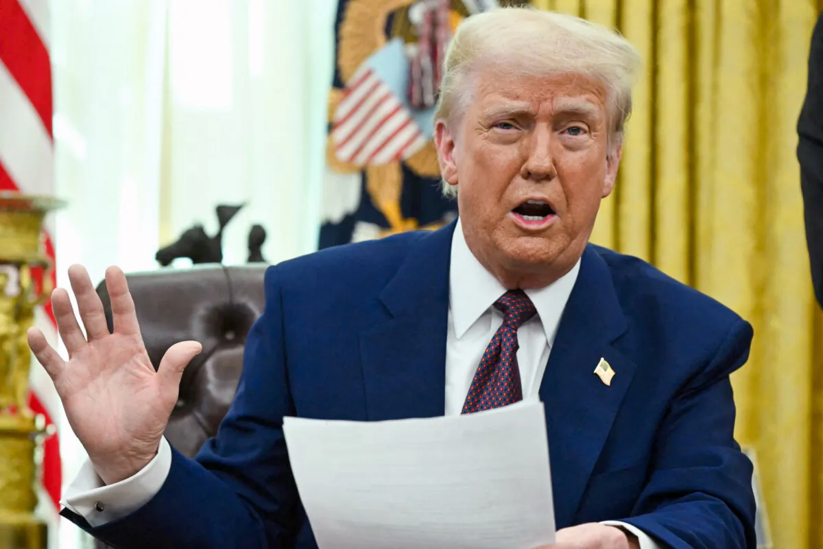 President Donald Trump speaks in the Oval Office as he announces reciprocal tariffs, on Feb. 13, 2025. (Andrew Caballero-Reynolds/AFP via Getty Images)