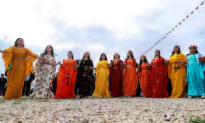 Day in Photos: Women’s Day in Syria, Climbing Big Ben, and Navy Open Day in Sydney
