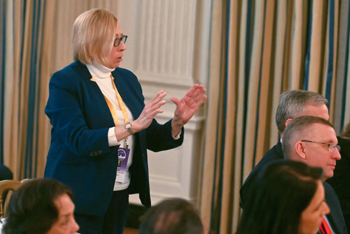 Maine Gov. Janet Mills speaks with President Donald Trump at the Governors Working Session in the State Dining Room of the White House in Washington on Feb. 21, 2025. (Jim Watson/AFP via Getty Images)