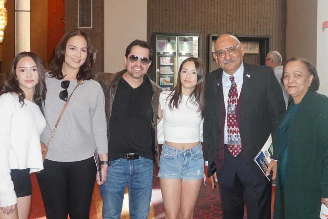 Manuel Bojorquez (2nd R) and family enjoyed Shen Yun Performing Arts at Symphony Hall in Phoenix, Arizona, on March 9, 2025. (Yeawen Hung/The Epoch Times)