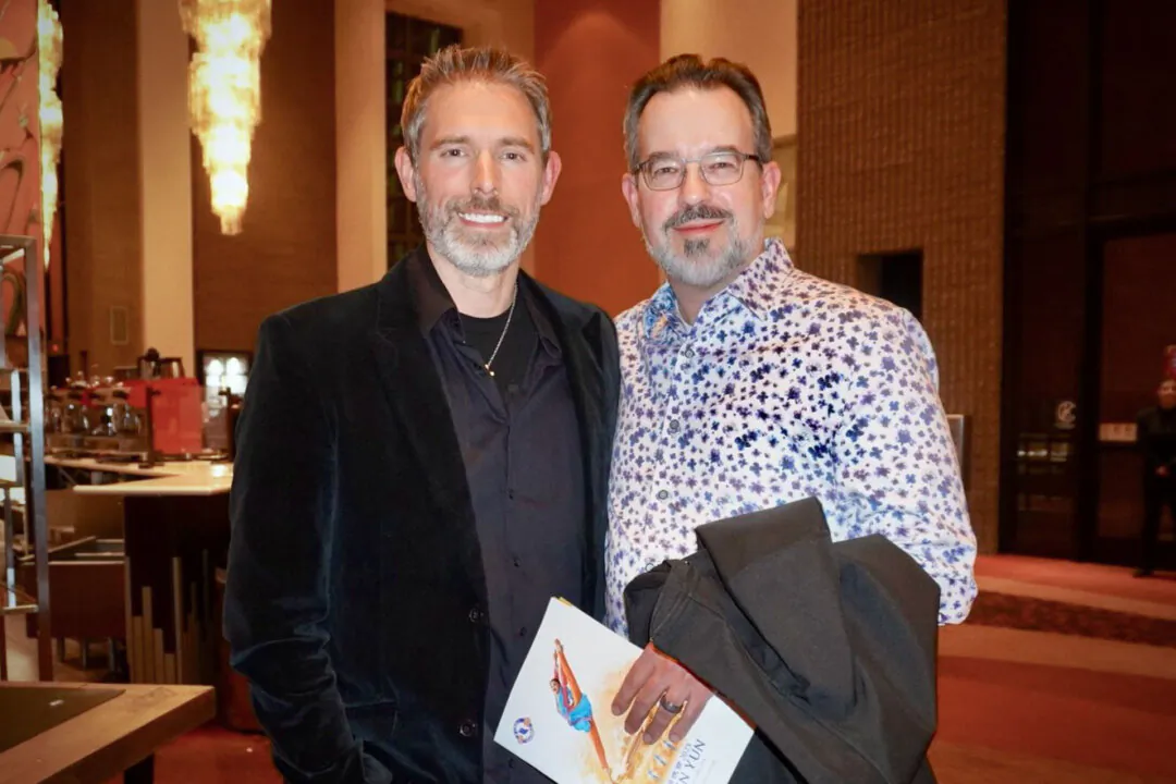 James Smith (R) enjoyed Shen Yun Performing Arts at Symphony Hall in Phoenix, Arizona, on March 8, 2025. (Sherry Dong/The Epoch Times)