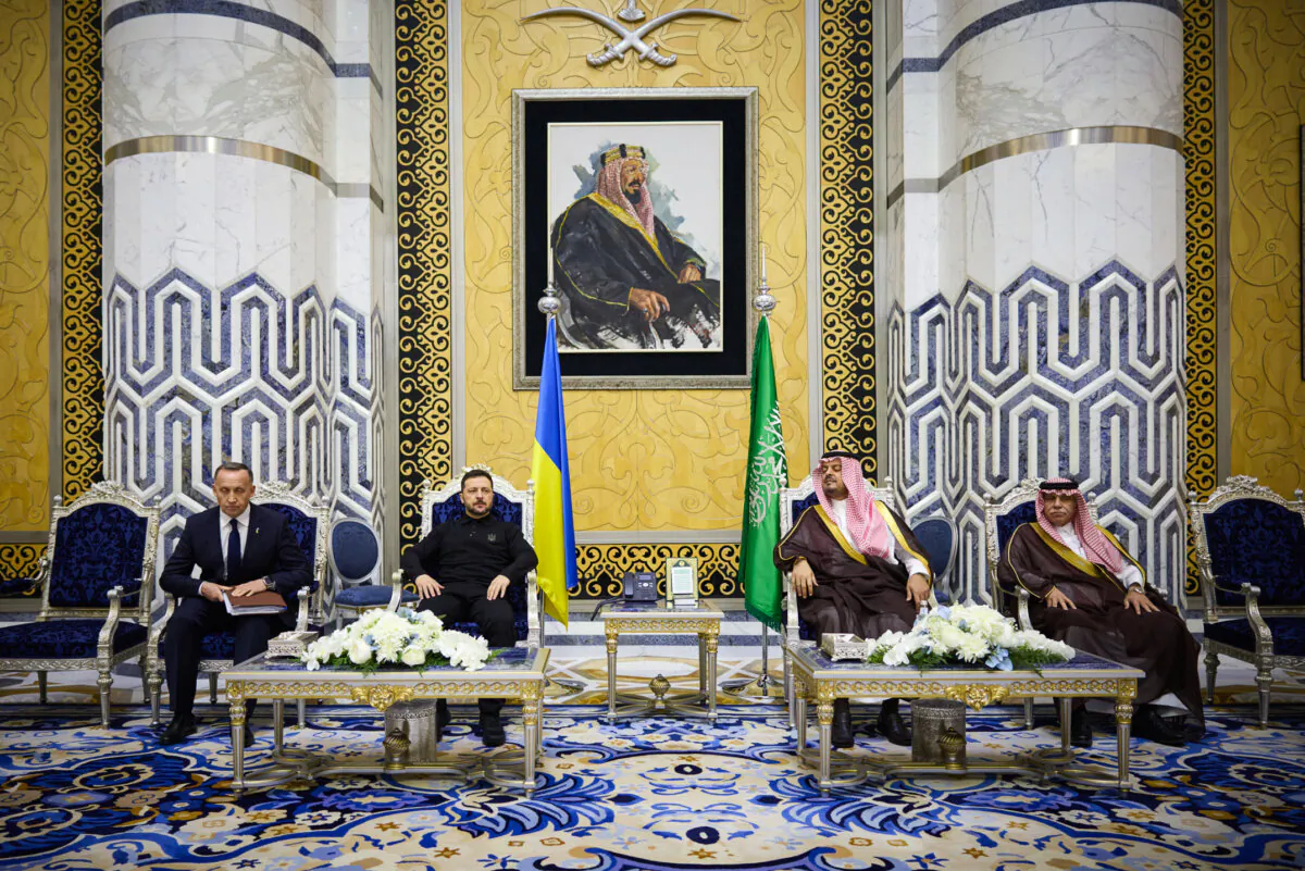 In this photo provided by the Ukrainian Presidential Press Office, Ukrainian President Volodymyr Zelenskyy (center L), meets with Prince Saud bin Mishaal, deputy governor of Saudi Arabia's Mecca region, (center R), and Saudi Commerce Minister Majid bin Abdullah al-Qasabi in Riyadh, Saudi Arabia, on March 10, 2025. (Ukrainian Presidential Press Office via AP)