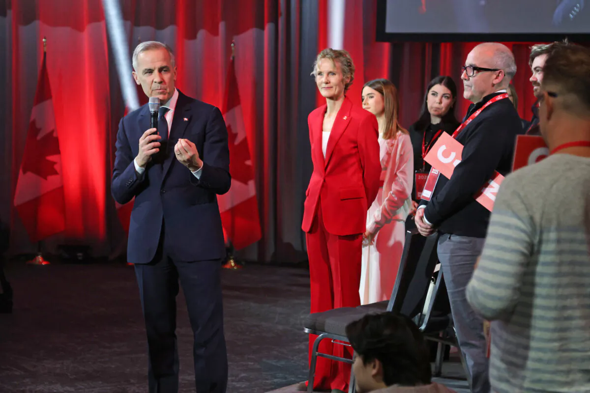 Mark Carney, who is now prime minister-designate, and his family at the Liberal leadership event in Ottawa on March 9, 2025. (Dave Chan/AFP via Getty Images)