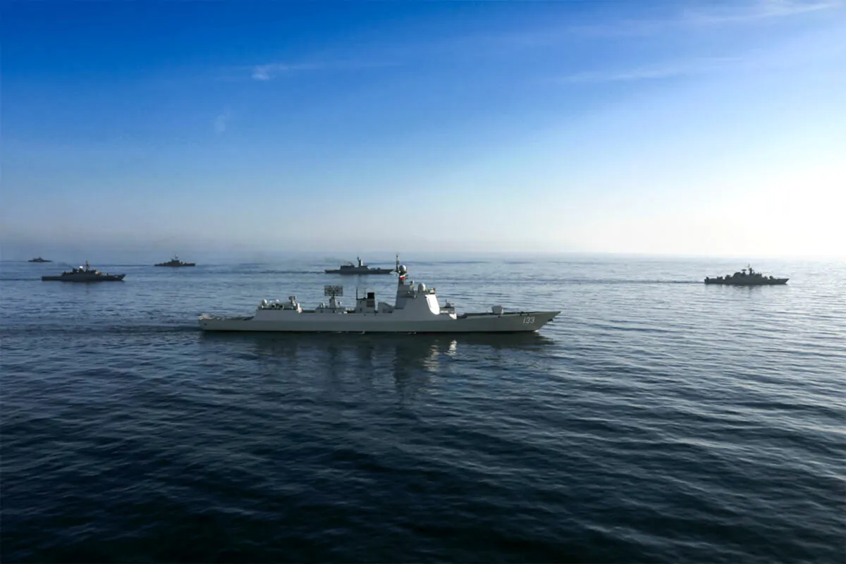 The Chinese People's Liberation Army Navy guided-missile destroyer Baotou (133) during joint military drills between Iran, Russia, and China in the Gulf of Oman on March 11, 2025. (Iranian Army office/AFP via Getty Images)