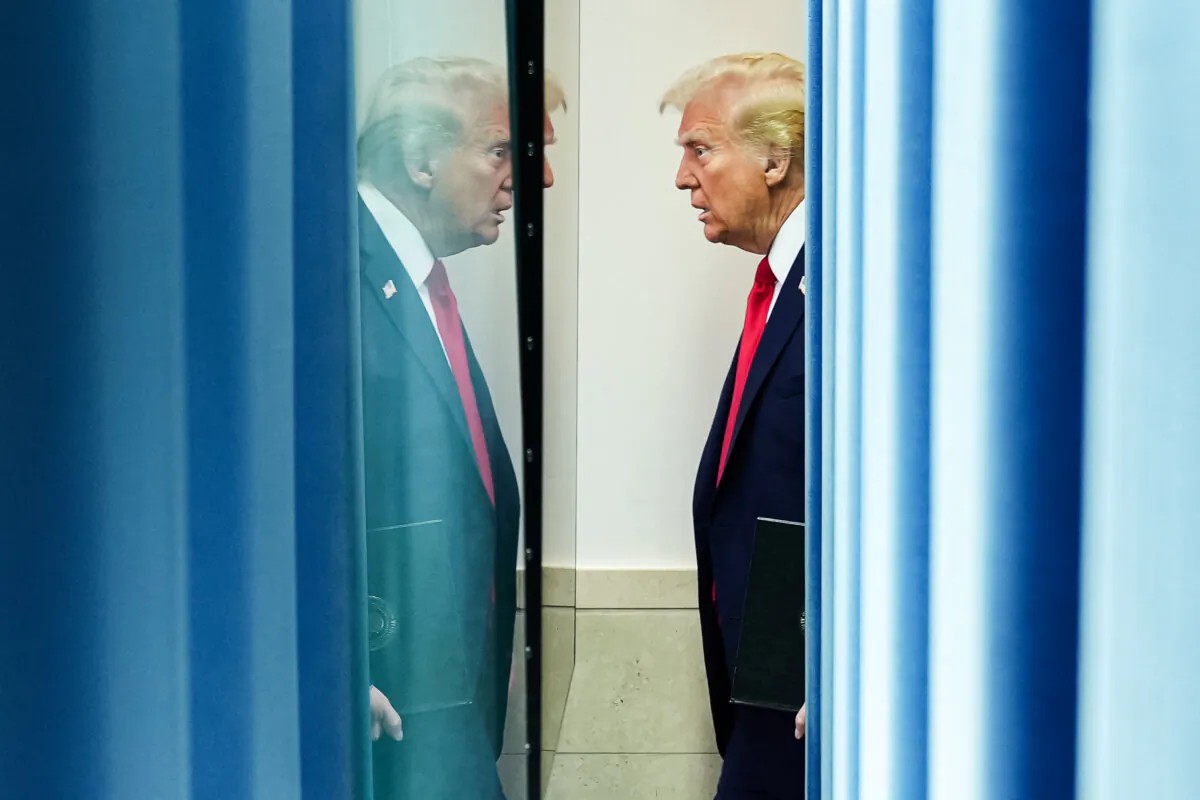 President Donald Trump arrives to speak about the mid-air crash between American Airlines flight 5342 and a military helicopter in Washington, at the White House on Jan. 30, 2025. (Oliver Contreras/AFP via Getty Images)