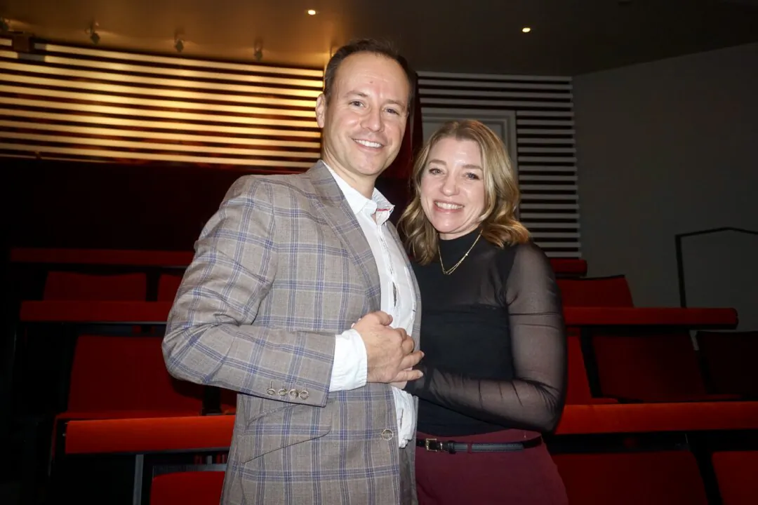 Josh Gordon and his partner enjoyed Shen Yun's evening performance at the Kauffman Center for the Performing Arts on March 12, 2025. (Yeawen Hung/The Epoch Times)