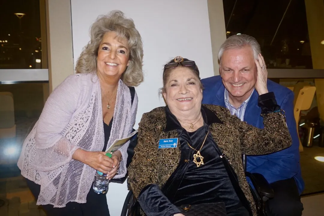 Marie Ann Stutz and her family enjoyed Shen Yun's evening performance at the Kauffman Center for the Performing Arts on March 12, 2025. (Yeawen Hung/The Epoch Times)