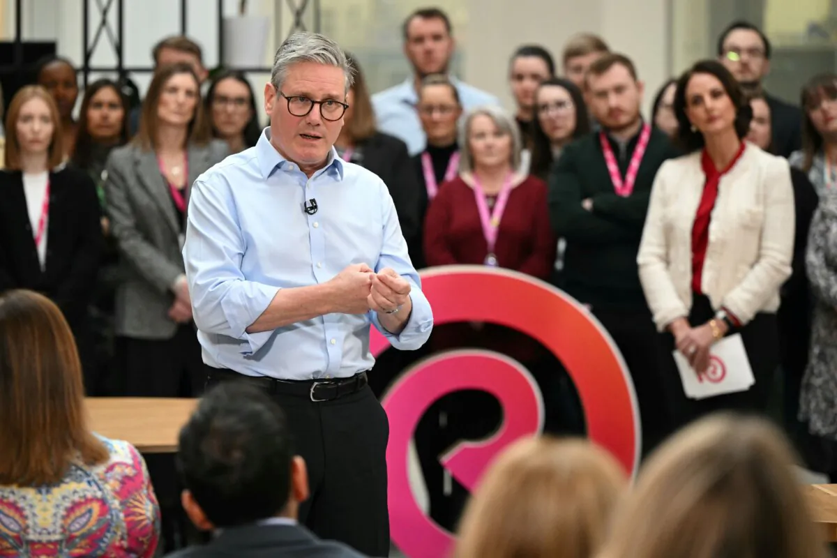 Prime Minister Sir Keir Starmer gestures during a Q&A session after delivering a speech on plans to reform the civil service, during a visit to Reckitt Benckiser Health Care UK in Kingston upon Hull, England, on March 13, 2025. (Oli Scarff - WPA Pool/Getty Images)