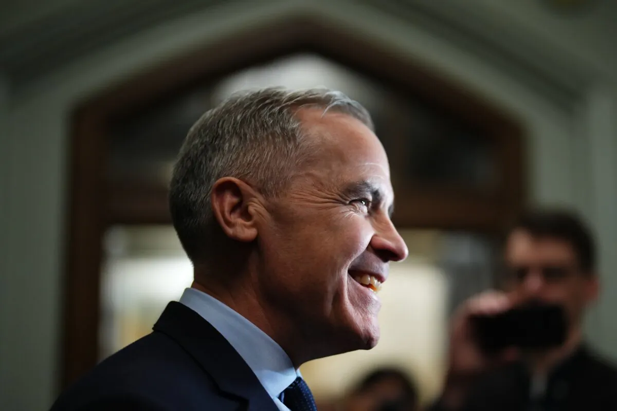 Liberal Leader Mark Carney talks to media as he leaves a caucus meeting in Ottawa, on March 10, 2025. (The Canadian Press/Sean Kilpatrick) 