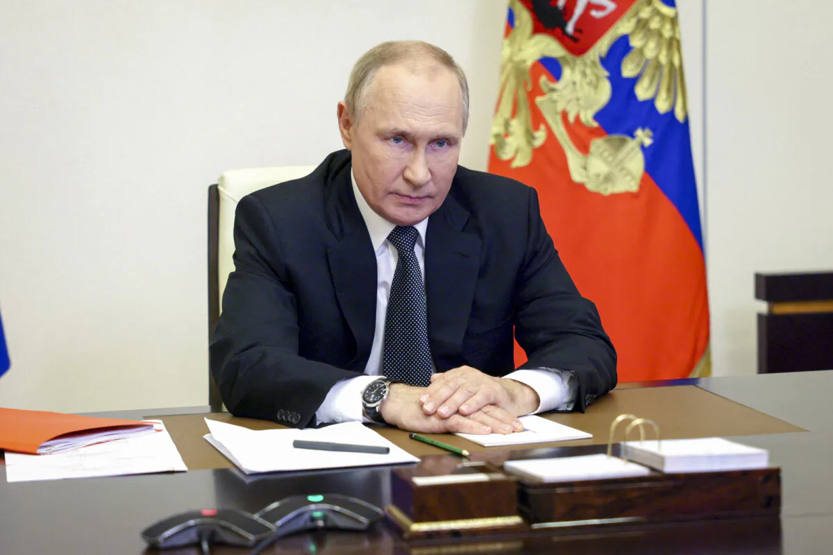Russian President Vladimir Putin chairs a Security Council meeting via a video link at the Novo-Ogaryovo state residence outside Moscow on Oct. 19, 2022. (Sergei Ilyin/SPUTNIK/AFP via Getty Images)