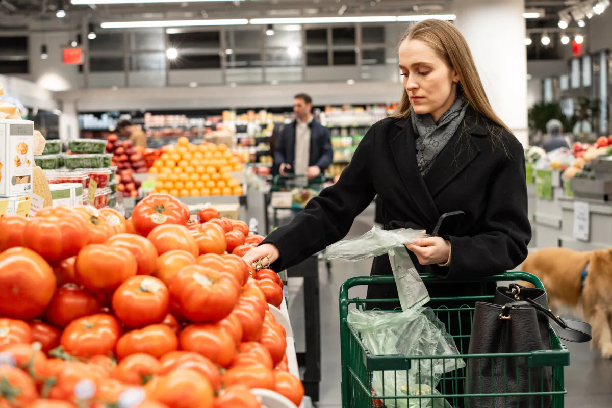 People shop at a grocery store in New York City on March 12, 2025. (Samira Bouaou/The Epoch Times)