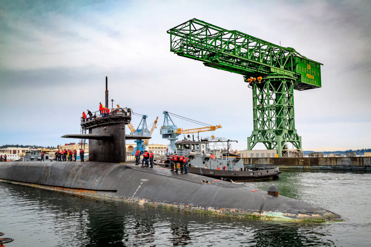 The guided-missile submarine USS Ohio arrives at Naval Base Kitsap-Bremerton to begin a major maintenance period at Puget Sound Naval Shipyard & Intermediate Maintenance Facility in Bremerton, Wash., on April 4, 2017. (Jeremy Moore/Released/U.S. Navy)