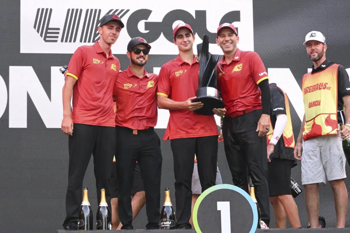 Spain’s Sergio Garcia (team R), individual winner of the LIV Golf Hong Kong 2025 event and captain of the winning Fireballs team, standing for photos after receiving the team trophy at the Hong Kong Golf Club, Fanling, Hong Kong, on March 9, 2025. (Bill Cox/The Epoch Times)