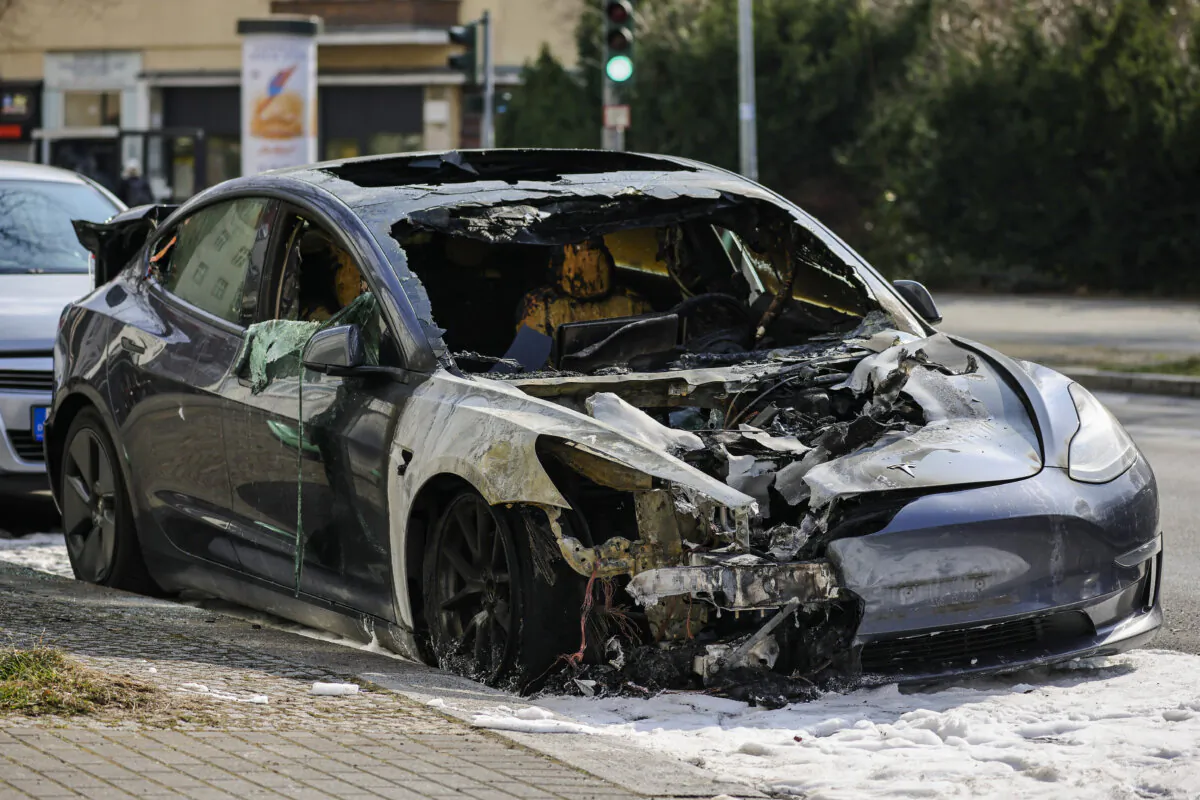 The burnt-out remains of a Tesla electric car in the Steglitz district in Berlin on March 14, 2025. (Omer Messinger/Getty Images)
