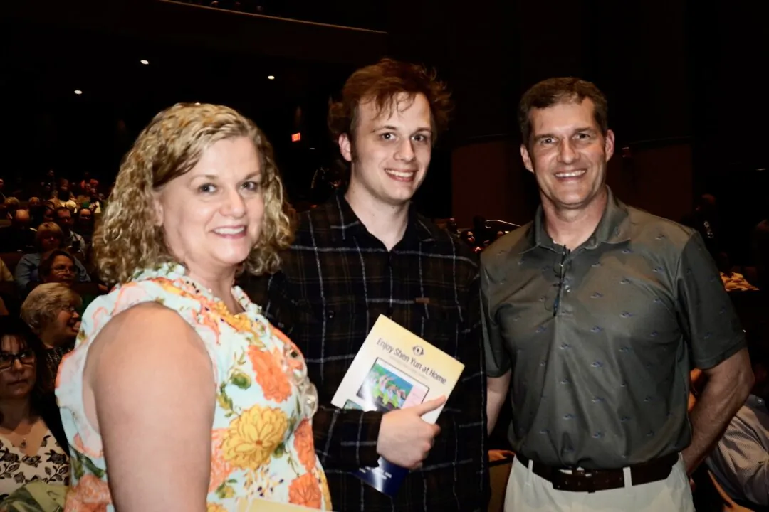 Flo, Caleb, and Shawn Doughty at the Shen Yun Performing Arts performance at Von Braun Center Concert Hall on March 13, 2025. (Nancy Ma/The Epoch Times)