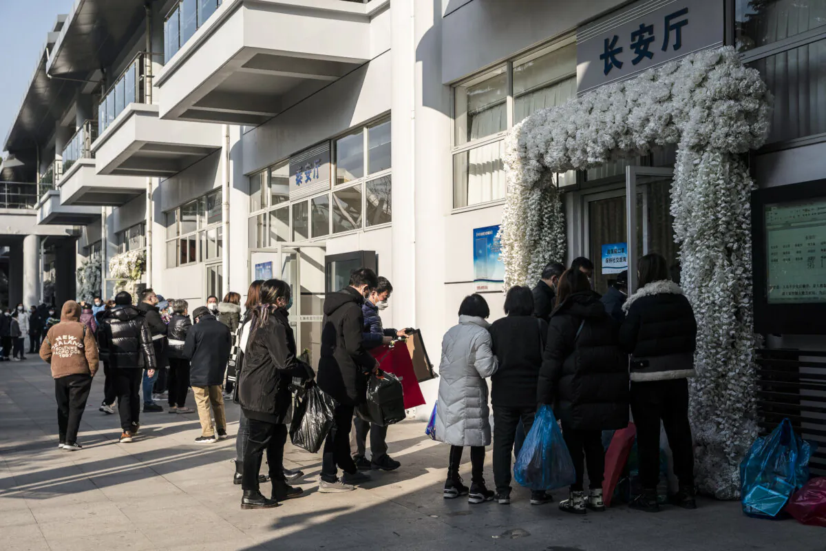 Mourners gather outside the memorial halls for the deceased at a funeral home in Shanghai, China, on Dec. 31, 2022. (Qilai Shen/Bloomberg via Getty Images)