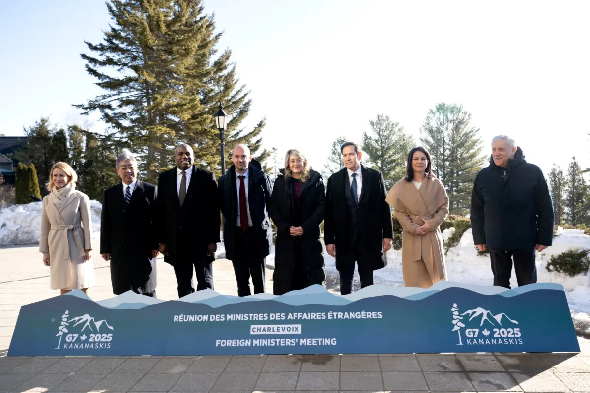 (L–R) European Union (EU) foreign policy chief Kaja Kallas, Japanese Foreign Minister Takeshi Iwaya, British Foreign Minister David Lammy, French Foreign Minister Jean-Noël Barrot, Canadian Foreign Minister Melanie Joly, U.S. Secretary of State Marco Rubio, German Foreign Minister Annalena Baerbock, and Italian Foreign Minister Antonio Tajani pose for a photo during the G7 meeting of foreign ministers in La Malbaie, Quebec, Canada, on March 13, 2025. (Saul Loeb/AFP via Getty Images)