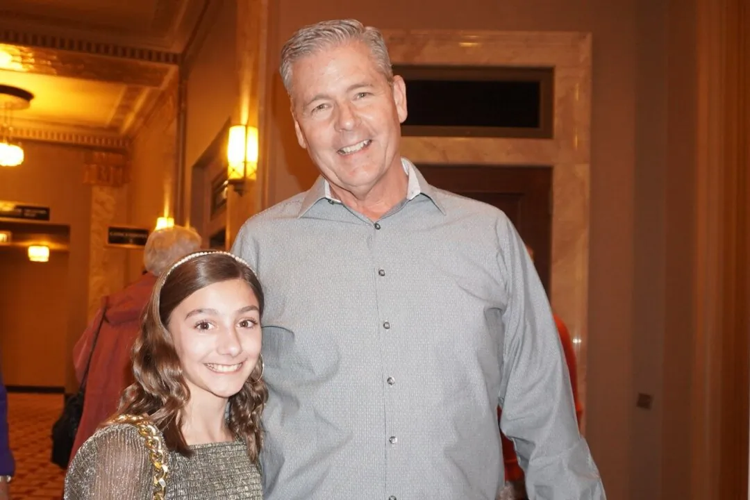 Brad Lewis and his daughter enjoyed Shen Yun at the Stifel Theatre in St. Louis, Missouri, on March 15, 2025. (Sherry Dong/The Epoch Times)