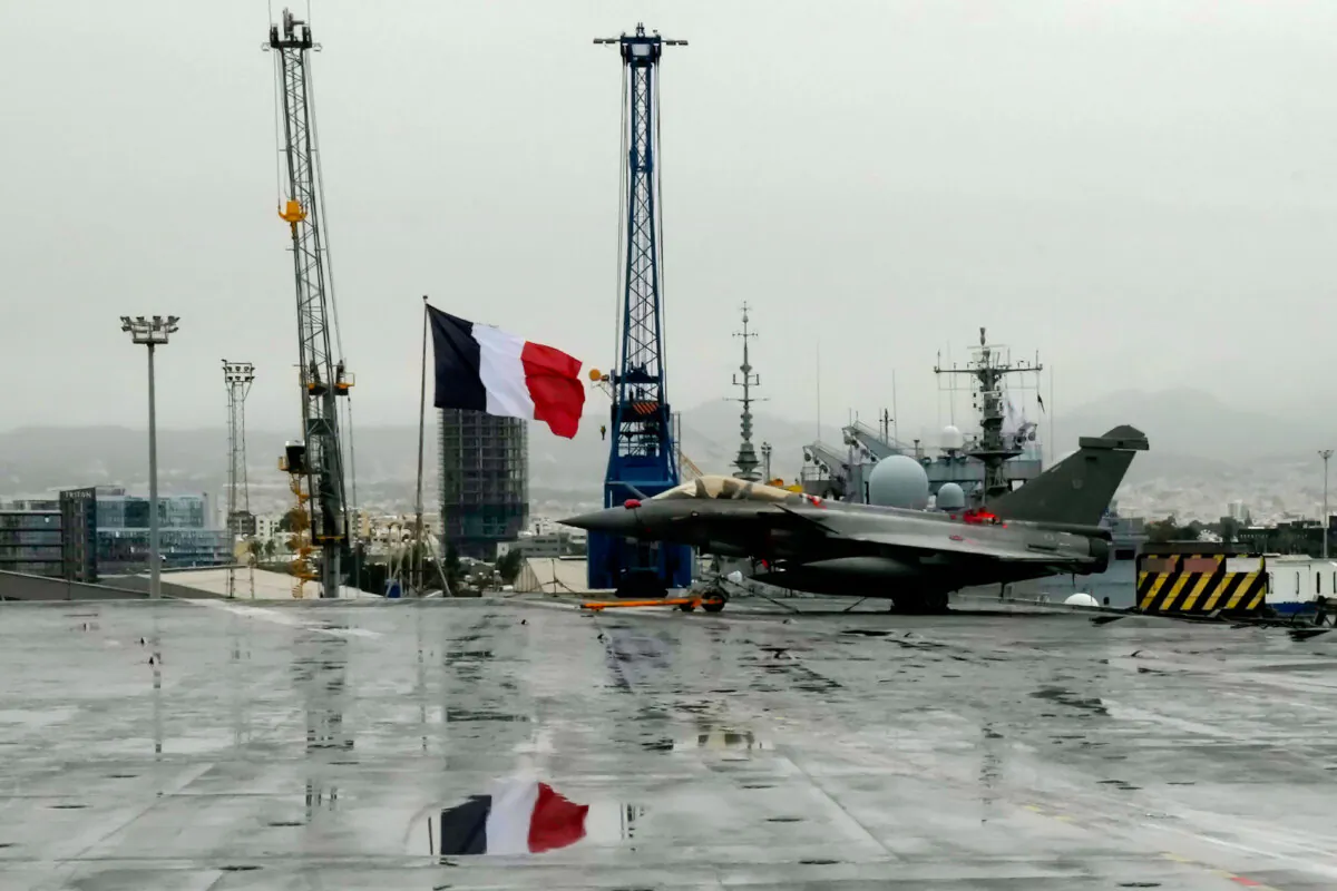 A Rafale jet fighter on France's nuclear-powered aircraft carrier Charles de Gaulle, at Limassol port in Cyprus, on March 1, 2022. (Petros Karadjias/AP)