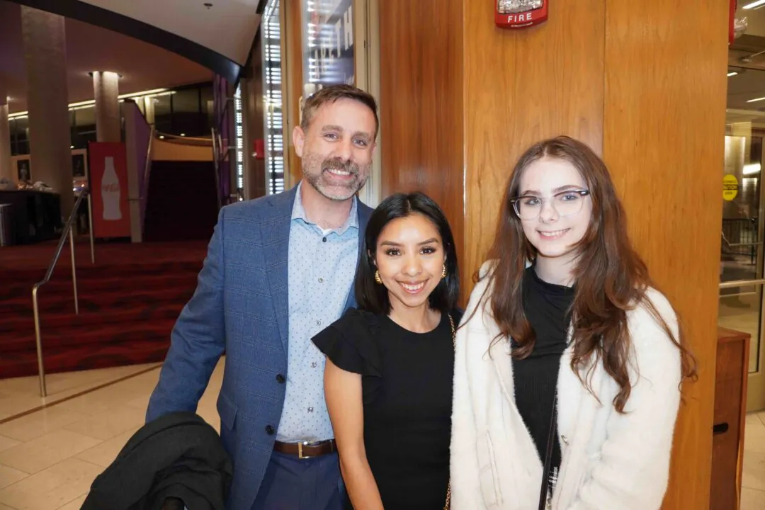 Sam, Jacqueline, and Sammy Taylor enjoyed Shen Yun's evening performance at the BJCC Concert Hall on March 15, 2025. (Sonia Wu/The Epoch Times)