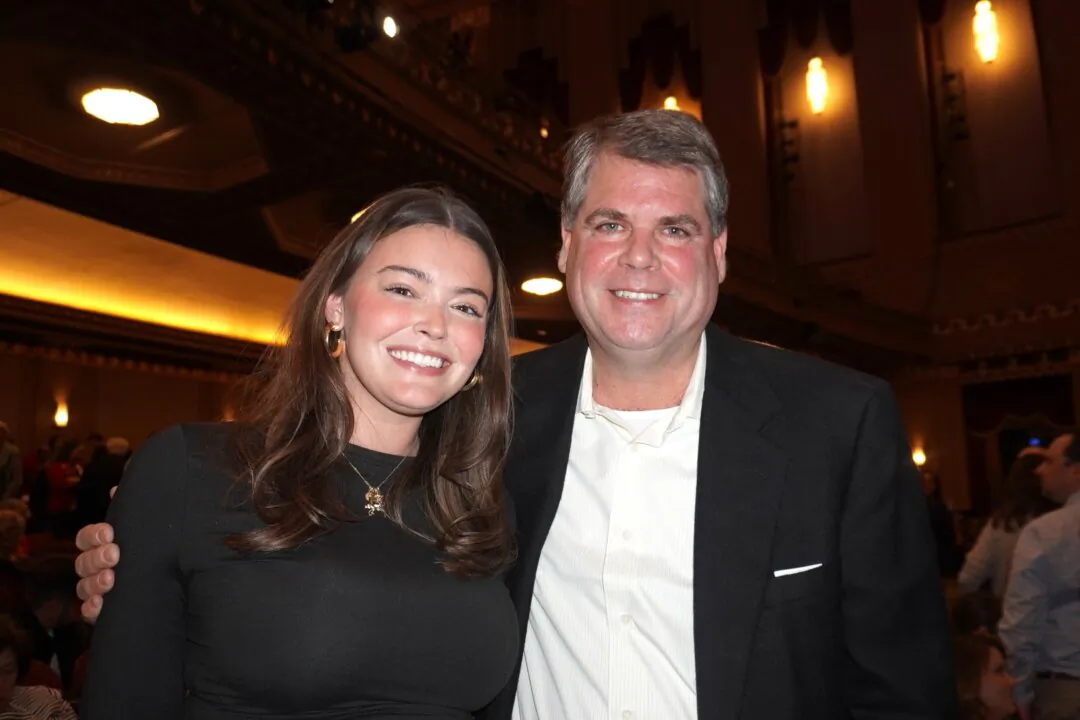 Jones Louis and his daughter enjoyed Shen Yun at the Stifel Theatre in St. Louis, Missouri, on March 16, 2025. (Sherry Dong/The Epoch Times) 