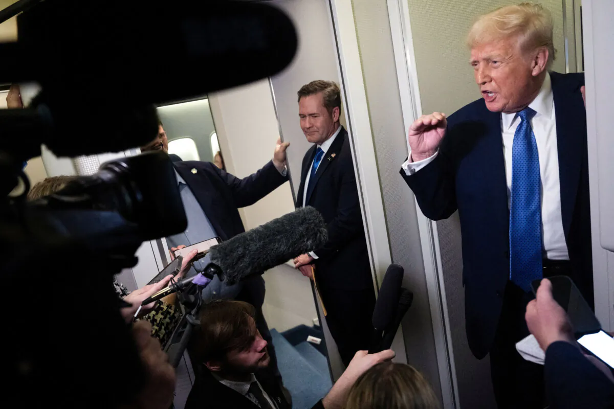 President Donald Trump speaks to reporters aboard Air Force One on March 16, 2025. (Brendaon Smialowski/AFP via Getty Images)