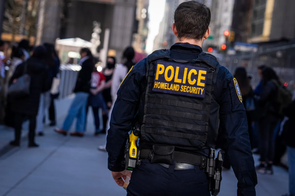 A Department of Homeland Security officer stands guard at 26 Federal Plaza in New York City on March 10, 2025. (David Dee Delgado/Getty Images)