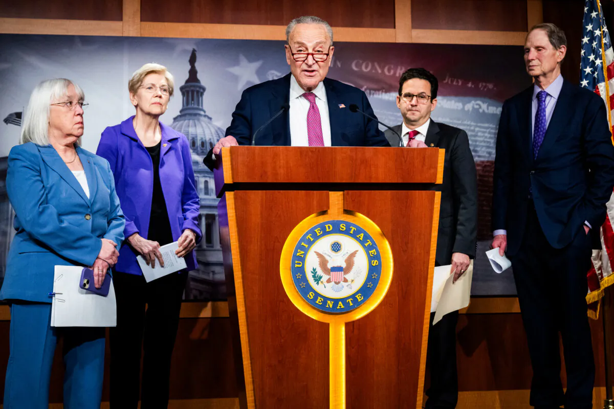 Senate Democratic Leader Chuck Schumer (D-N.Y.) (C) speaks alongside (L–R) Sens. Patty Murray (D-Wash.), Elizabeth Warren (D-Mass.), Brian Schatz (D-Hawaii), and Ron Wyden (D-Ore.) about Elon Musk and DOGE accessing government agencies' data during a news conference at the U.S. Capitol on Feb. 3, 2025.