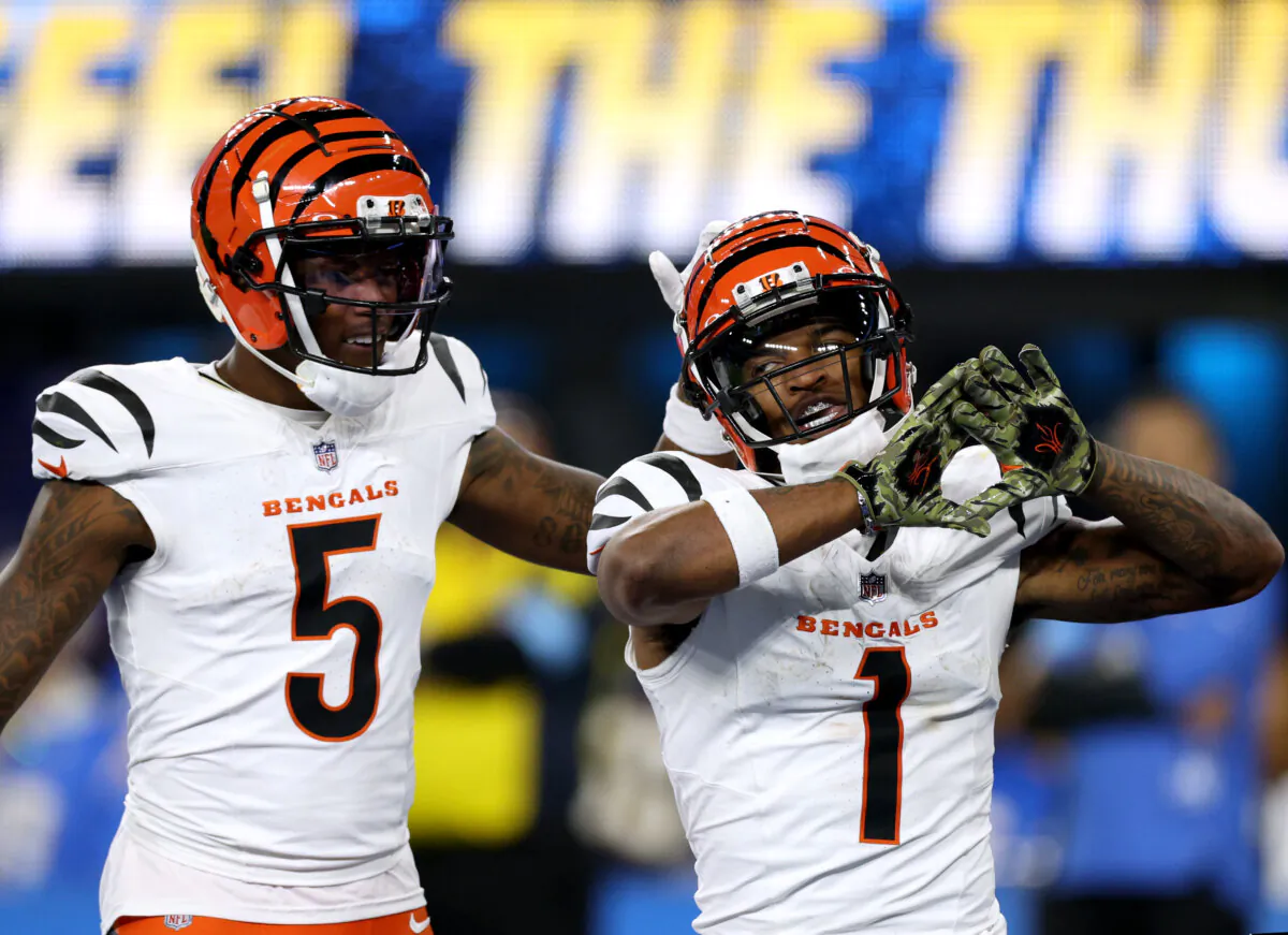 Ja'Marr Chase (R) of the Cincinnati Bengals celebrates his touchdown with Tee Higgins during a 34-27 loss to the Los Angeles Chargers at SoFi Stadium on Nov. 17, 2024, in Inglewood, Calif. (Harry How/Getty Images)