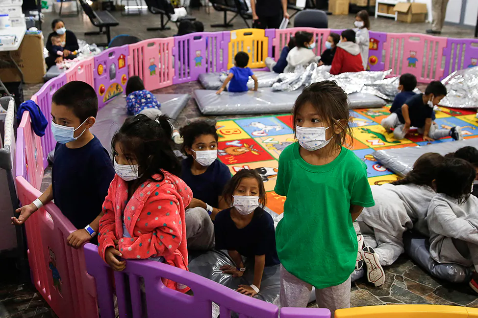Children ages 3 to 9 at the Donna Department of Homeland Security holding facility, the main detention center for unaccompanied children in the Rio Grande Valley, in Donna, Texas, on March 30, 2021. (Dario Lopez-Mills/Pool/AFP/Getty Images)