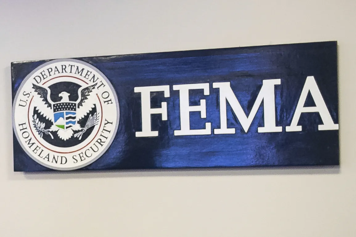 A sign for the Federal Emergency Management Agency is pictured at FEMA headquarters in Washington on April 20, 2020. (Al Drago/The New York Times via AP, Pool)
