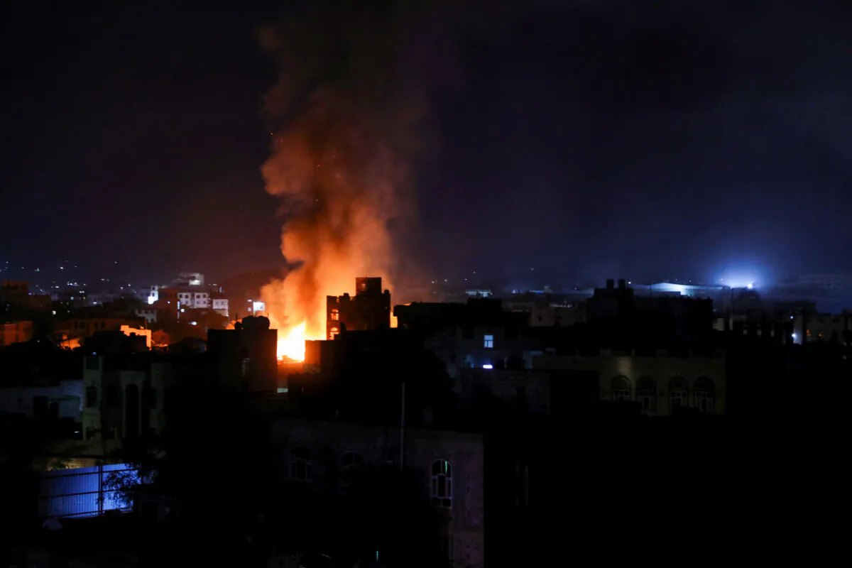 Fire and smoke billow from the site of an air strike in Sanaa, Yemen, on March 19, 2025. (Khaled Abdullah/Reuters)